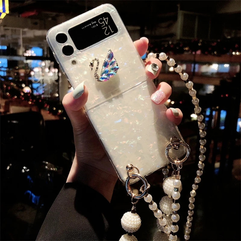 Роскошный яркий 3D-чехол для телефона с изображением лебедя и кристаллов для Samsung Galaxy Z Flip 4 3, чехлы с длинной цепочкой и толстым браслетом
Роскошный яркий 3D-чехол для телефона с изображением лебедя и кристаллов для Samsung Galaxy Z Flip 4 3, чехлы с длинной цепочкой и толстым браслетом