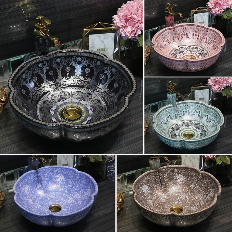 European-style washbasin with ceramic art basin on the platform; petal-shaped washbasin for household bathroom.
European-style washbasin with ceramic art basin on the platform; petal-shaped washbasin for household bathroom.