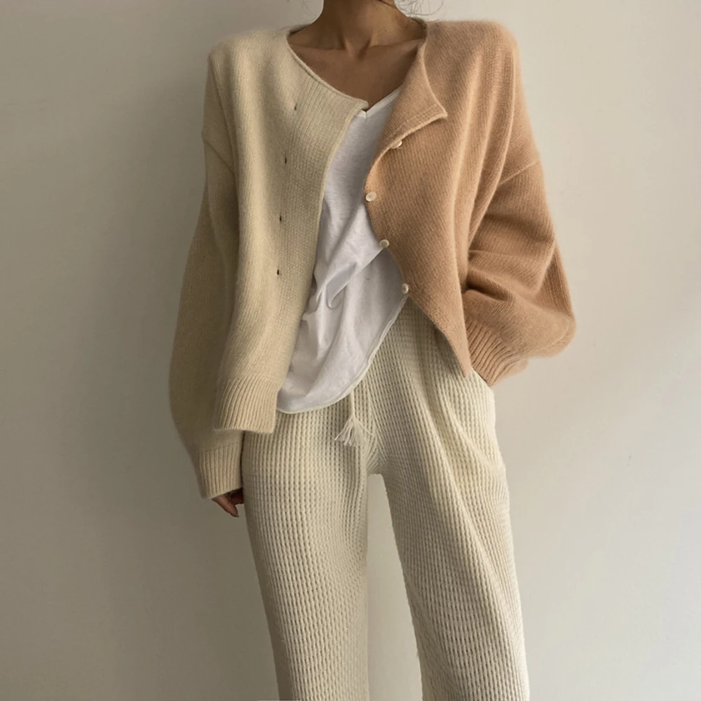 Autumn And Winter Women Simple And Versatile Round Neck Color Blocked Loose Long Sleeved Knitted Cardigan Sweater Jacket
Autumn And Winter Women Simple And Versatile Round Neck Color Blocked Loose Long Sleeved Knitted Cardigan Sweater Jacket