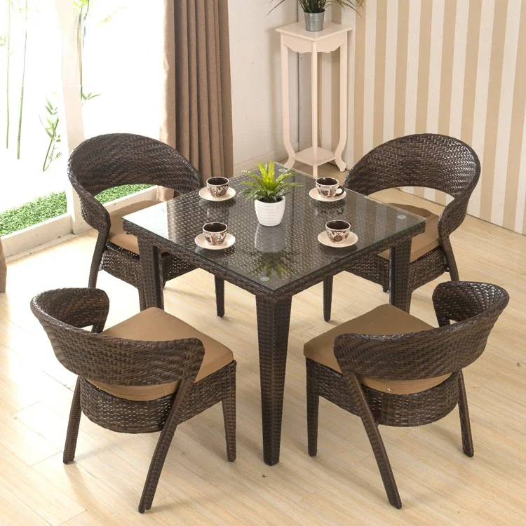 Outdoor table and chair Rattan table and chair leisure cafe balcony courtyard table and chair solid wood rattan chair coffee
Outdoor table and chair Rattan table and chair leisure cafe balcony courtyard table and chair solid wood rattan chair coffee