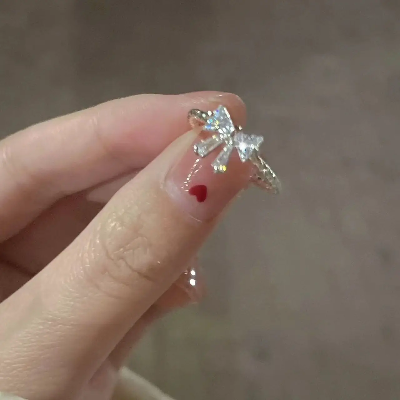 S925 Silver bow flash diamond ring female opening adjustable ring ring sweet girl heart send boudoir girlfriend
S925 Silver bow flash diamond ring female opening adjustable ring ring sweet girl heart send boudoir girlfriend