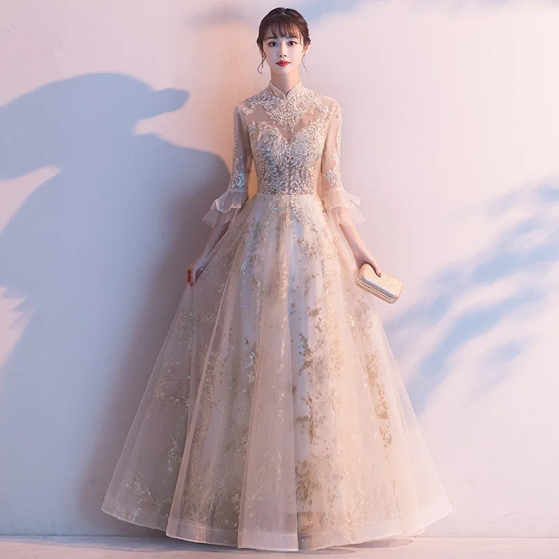 Chinese Stand-up Collar Prom Dress Sexy Lace Temperament Gauze Skirt Champagne Flared Sleeves Elegant Princess Pompous Vestidos
Chinese Stand-up Collar Prom Dress Sexy Lace Temperament Gauze Skirt Champagne Flared Sleeves Elegant Princess Pompous Vestidos