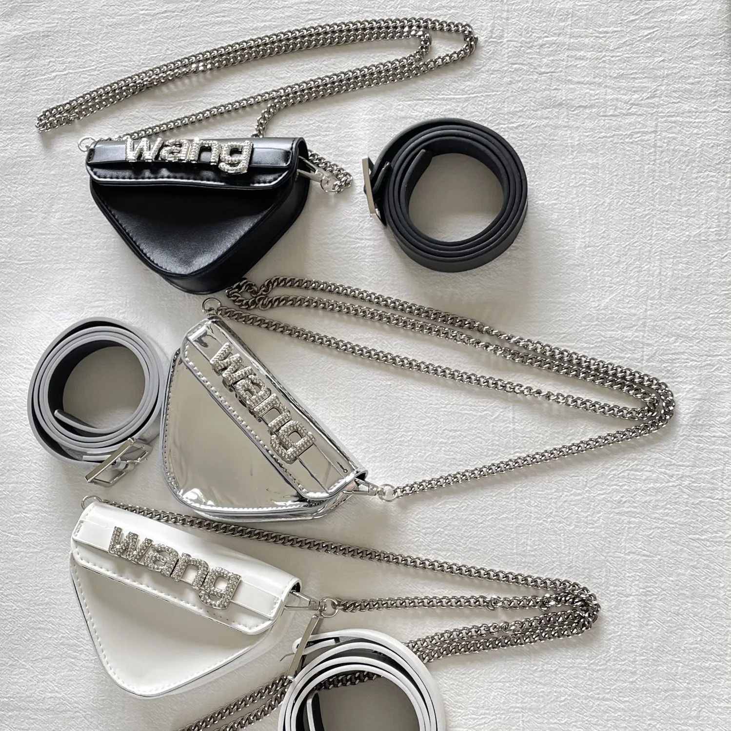 New Diamond Wang Letter Bag Design Is Simple and High-end Triangular Waist Bag Female Trend Hot Girl Style Mini Messenger Bag
New Diamond Wang Letter Bag Design Is Simple and High-end Triangular Waist Bag Female Trend Hot Girl Style Mini Messenger Bag