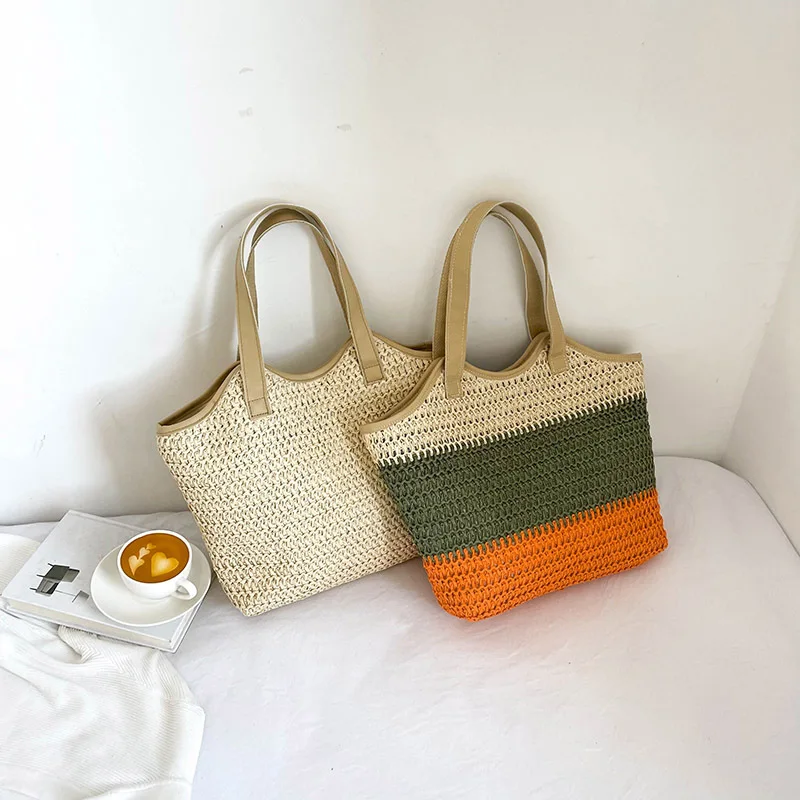 Women Hand Bags New Straw Woven Handbag Hollow Tote Shoulder Bag Simple Large Capacity Casual Simple Shoulder Bags for Women 
Women Hand Bags New Straw Woven Handbag Hollow Tote Shoulder Bag Simple Large Capacity Casual Simple Shoulder Bags for Women