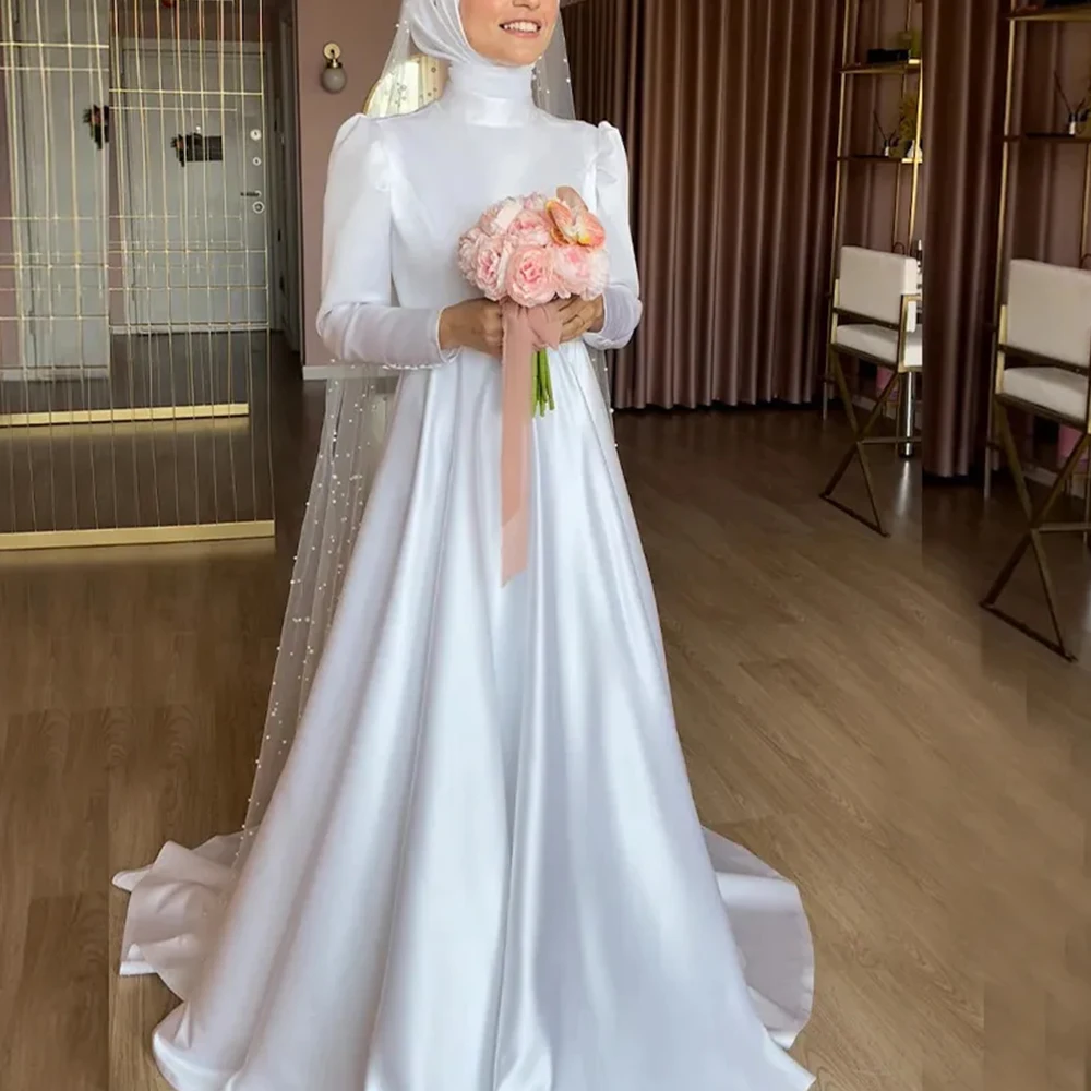 Muslim Satin A-line Long Sleeved Wedding Dresses Draped Pleat Brush Train Bride Dresses Floor Length High Collar robe de mariée
Muslim Satin A-line Long Sleeved Wedding Dresses Draped Pleat Brush Train Bride Dresses Floor Length High Collar robe de mariée