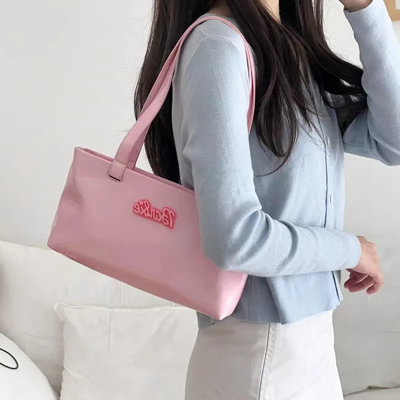 Barbie Woman's Shoulder Bag Female Niche Design Bright Face Large Capacity Travel PU Waterproof Handbag Armpit Baguette Bag
Barbie Woman's Shoulder Bag Female Niche Design Bright Face Large Capacity Travel PU Waterproof Handbag Armpit Baguette Bag