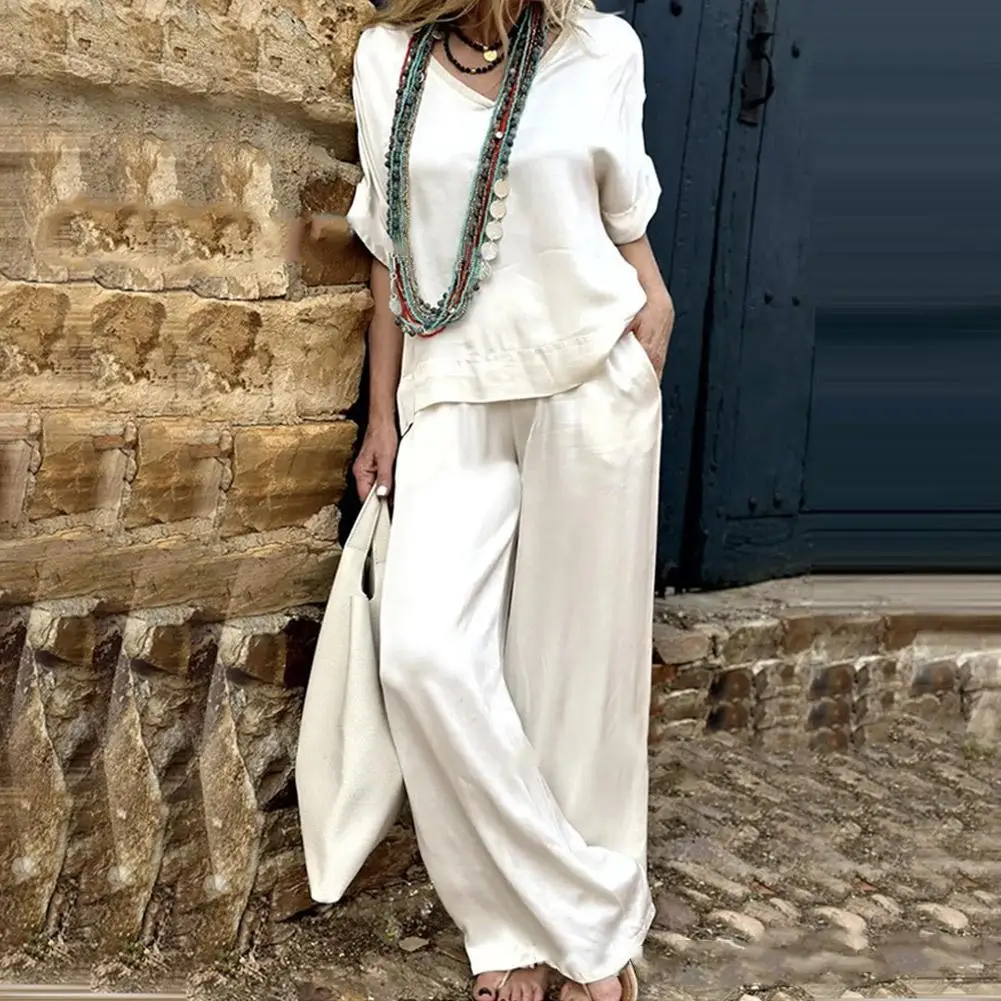 Womens Summer 2 Piece Outfits Short Sleeve Pullover Tops V Neck Shirt Top Wide Leg Pants Lounge Sets Loose Fit Casual Outfit
Womens Summer 2 Piece Outfits Short Sleeve Pullover Tops V Neck Shirt Top Wide Leg Pants Lounge Sets Loose Fit Casual Outfit