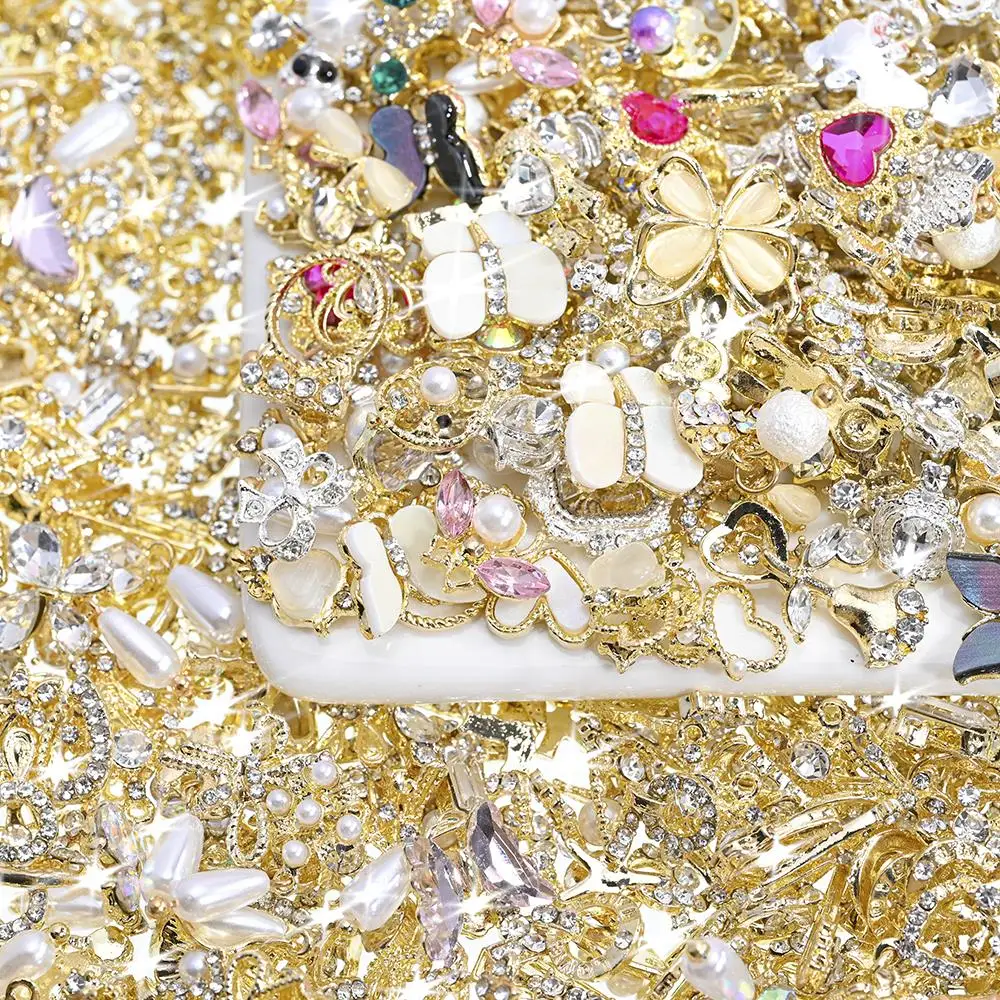 50Pcs Alloy Luxury Nail Art Dangle Charms Gold Silver Heart Bowknot Mixed 3D Nail Rhinestones Tassel Design Nail Art Decoration
50Pcs Alloy Luxury Nail Art Dangle Charms Gold Silver Heart Bowknot Mixed 3D Nail Rhinestones Tassel Design Nail Art Decoration