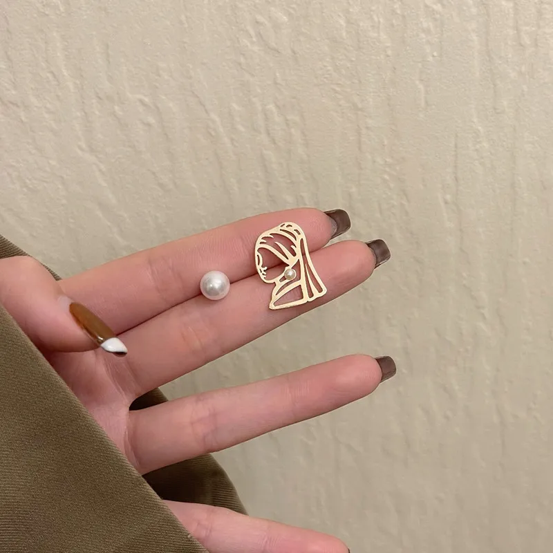 Timlee E163 New Cartoon Cute Hollowed Out Girl Face Imitation Pearl Alloy Studs Earrings Fashion Accessories Wholesale
Timlee E163 New Cartoon Cute Hollowed Out Girl Face Imitation Pearl Alloy Studs Earrings Fashion Accessories Wholesale