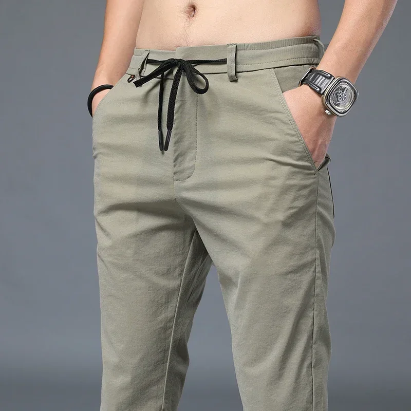

Korean Style Men Casual Pants Thin Summer Regular Fit Cargo Pants Elastic Waist Black Pants 2021 Fashion Gray Black Khaki,883