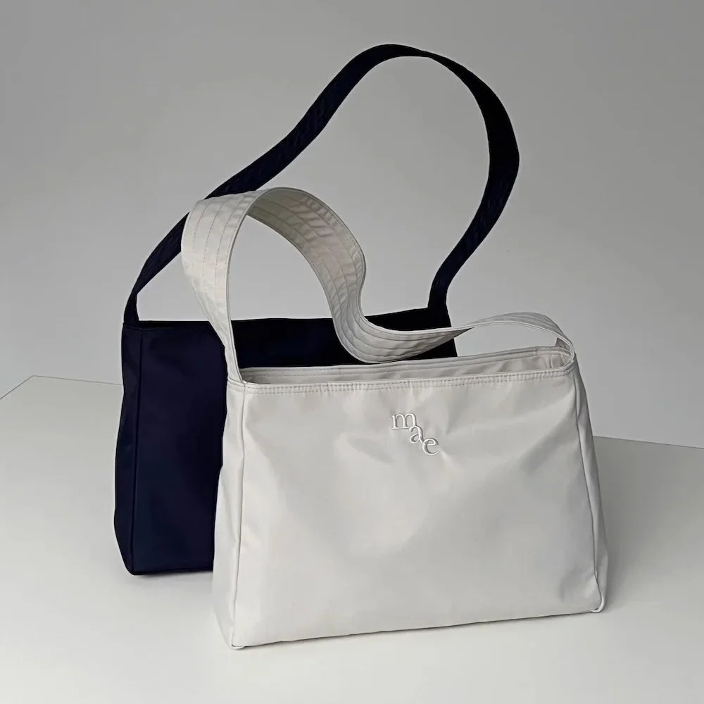 

Korean Fashion Brand Design Tote Bag Mucu and Ebony Bags Armpit Nylon Embroidered Logo Handbag Women's Simple Shoulder Bag