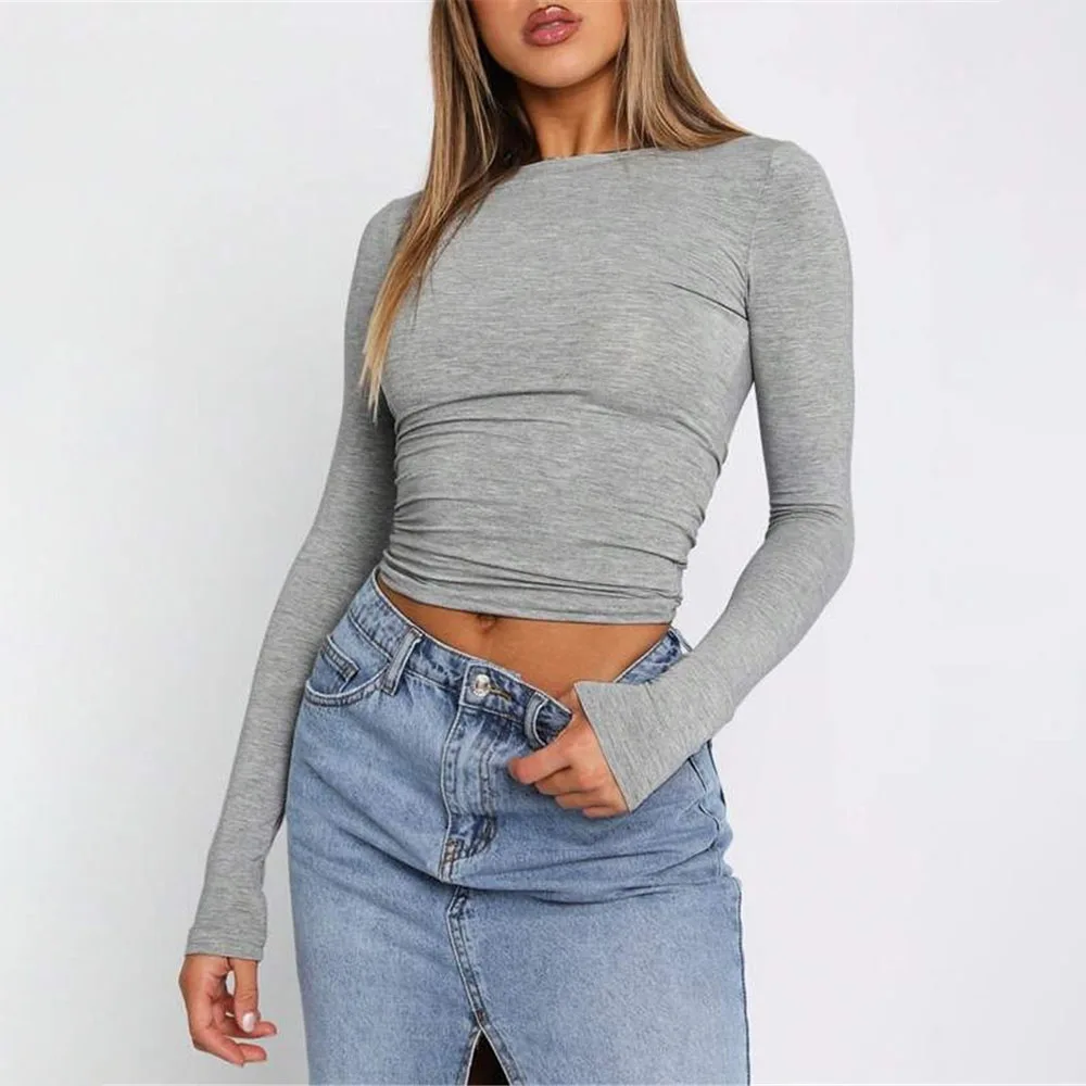 Женская облегающая футболка с длинным рукавом и круглым вырезом
Женская облегающая футболка с длинным рукавом и круглым вырезом