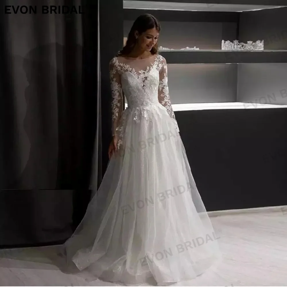EVON Scoop Long Sleeves A-Line Tulle Wedding Dresses For Women 2024 Appliques Lace Button Backless Bridal Gown Vestido De Novia 
EVON Scoop Long Sleeves A-Line Tulle Wedding Dresses For Women 2024 Appliques Lace Button Backless Bridal Gown Vestido De Novia