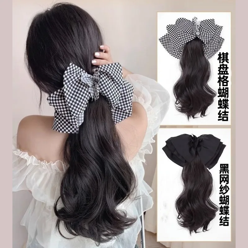 Best-selling ponytail wig for women on Douyin. It has clip-style bow, curly hair, low-tie, and is made of chemical fiber. Suppor
Best-selling ponytail wig for women on Douyin. It has clip-style bow, curly hair, low-tie, and is made of chemical fiber. Suppor