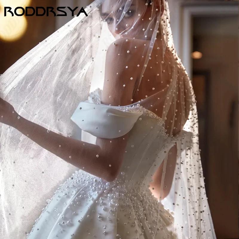 RODDRSYA Off Shoulder Pearl Wedding Dress For Women Soft Satin Court Train Vestido De Novia Elegant Zipper Backless Bridal Party
RODDRSYA Off Shoulder Pearl Wedding Dress For Women Soft Satin Court Train Vestido De Novia Elegant Zipper Backless Bridal Party