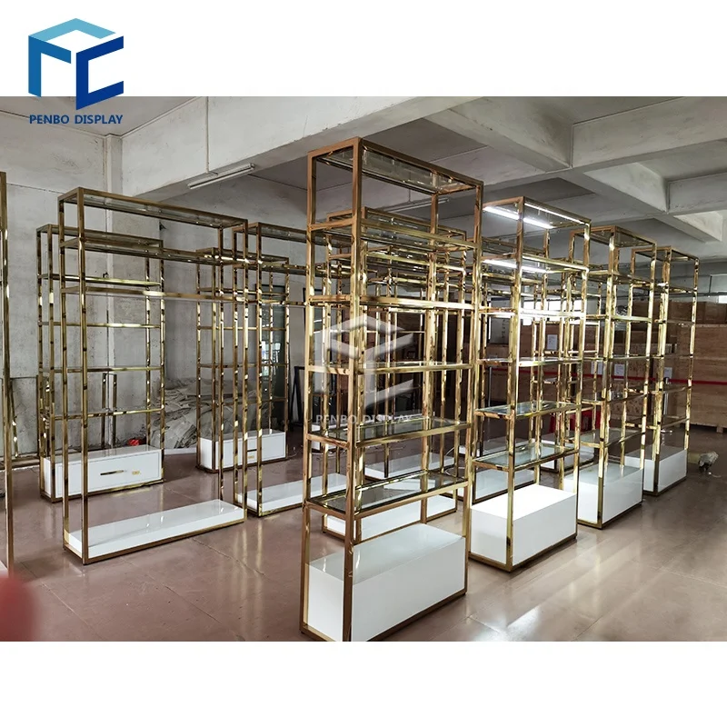 

CustomHigh Quality Gold Display Shelf Furniture Stand Design for Garment Store Clothing Display Rack