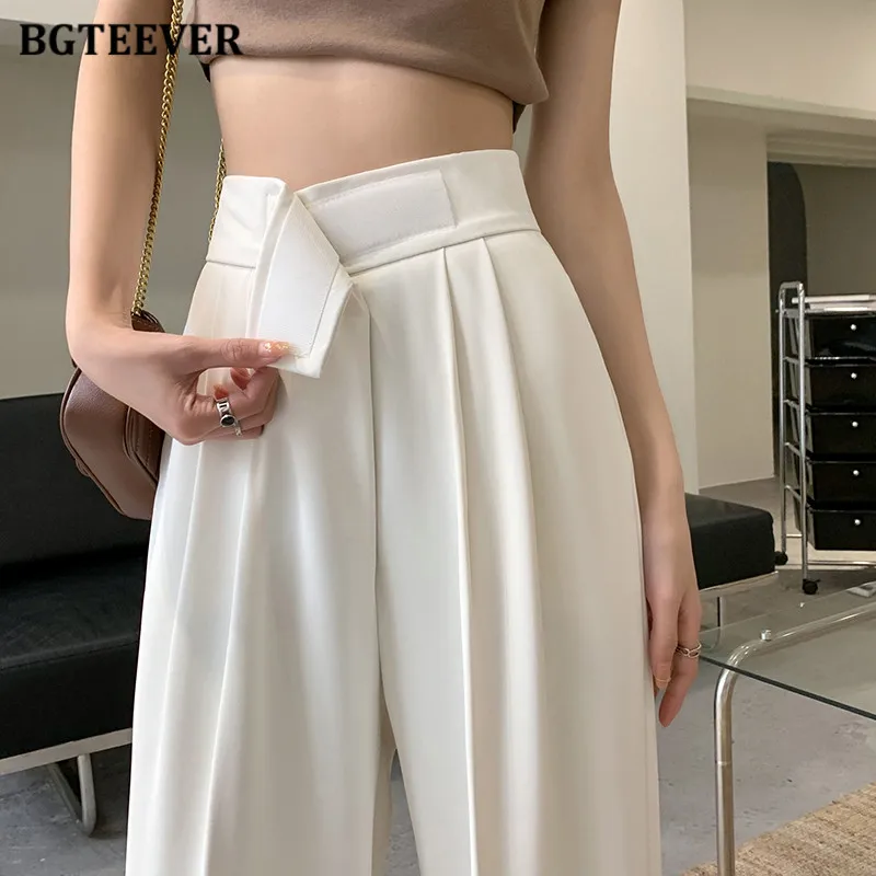 Стильные Свободные женские брюки BGTEEVER с широкими штанинами, модные прямые женские Костюмные брюки с высокой талией, Осенние белые брюки для женщин
Стильные Свободные женские брюки BGTEEVER с широкими штанинами, модные прямые женские Костюмные брюки с высокой талией, Осенние белые брюки для женщин