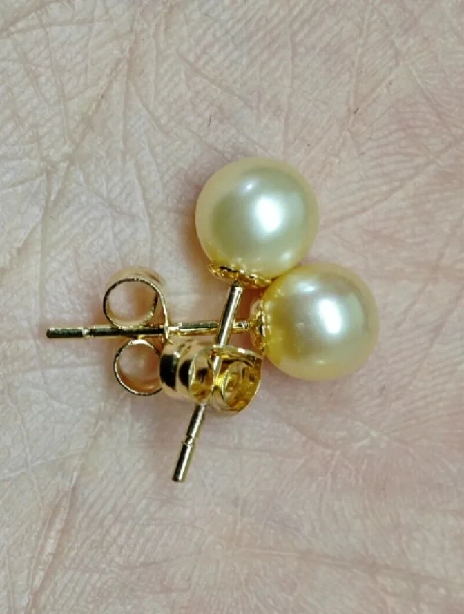 NEW PERFECT AAAA Real Australian South Sea Feather Gold 7-8 MM Round Pearl Earrings 14k Exquisite jewelry, exquisite earrings,
NEW PERFECT AAAA Real Australian South Sea Feather Gold 7-8 MM Round Pearl Earrings 14k Exquisite jewelry, exquisite earrings,