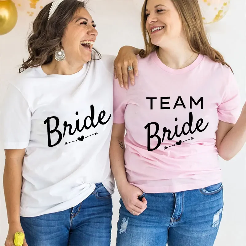 Модная футболка для команды невесты, друзей, девичника, вечерние, хлопковые футболки, Cupid Arrow Graphic Y2k, женские топы, свадебная футболка для невесты
Модная футболка для команды невесты, друзей, девичника, вечерние, хлопковые футболки, Cupid Arrow Graphic Y2k, женские топы, свадебная футболка для невесты