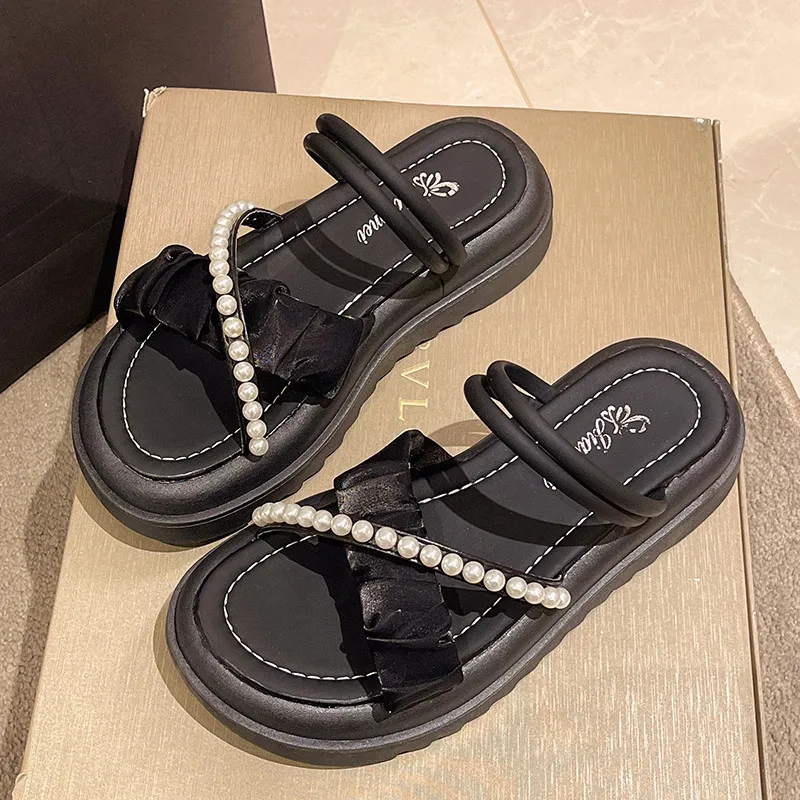 Fairy style one line slippers for women's outerwear 2024 summer new fashion versatile thick soled raised sandals
Fairy style one line slippers for women's outerwear 2024 summer new fashion versatile thick soled raised sandals