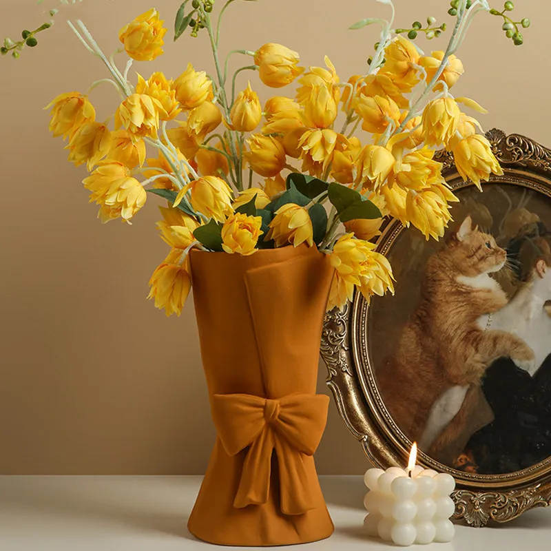 Ceramic Bowknot Vase Creative Dried Flower Arrangement Accessories Craft Vase for Countertop/Living Room Home Decoration
Ceramic Bowknot Vase Creative Dried Flower Arrangement Accessories Craft Vase for Countertop/Living Room Home Decoration