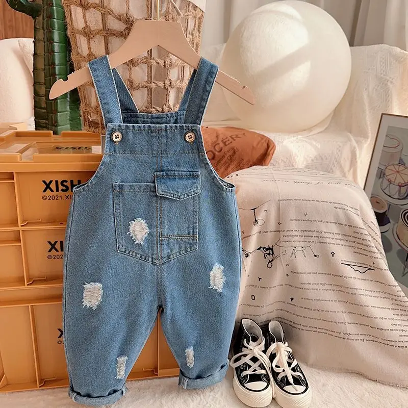 Boys and Girls' Denim Strap Pants 2023 Baby Strap Pants Children's Spring and Autumn Fashionable Perforated Pants
Boys and Girls' Denim Strap Pants 2023 Baby Strap Pants Children's Spring and Autumn Fashionable Perforated Pants