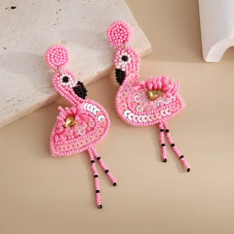 Beaded earrings Sequin Flamingo Design Originality Hand knitting Bohemia Alloy Tide Simple Rice bead earrings
Beaded earrings Sequin Flamingo Design Originality Hand knitting Bohemia Alloy Tide Simple Rice bead earrings