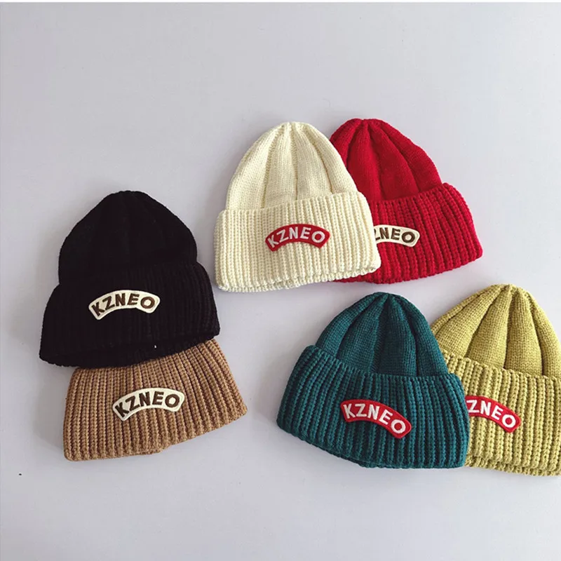 

49-54cm Korean Style Children Knitted Hat 2023 Letter Pointed Top Pullover Hat Boys and Girls Solid Color Letter Warm beanies