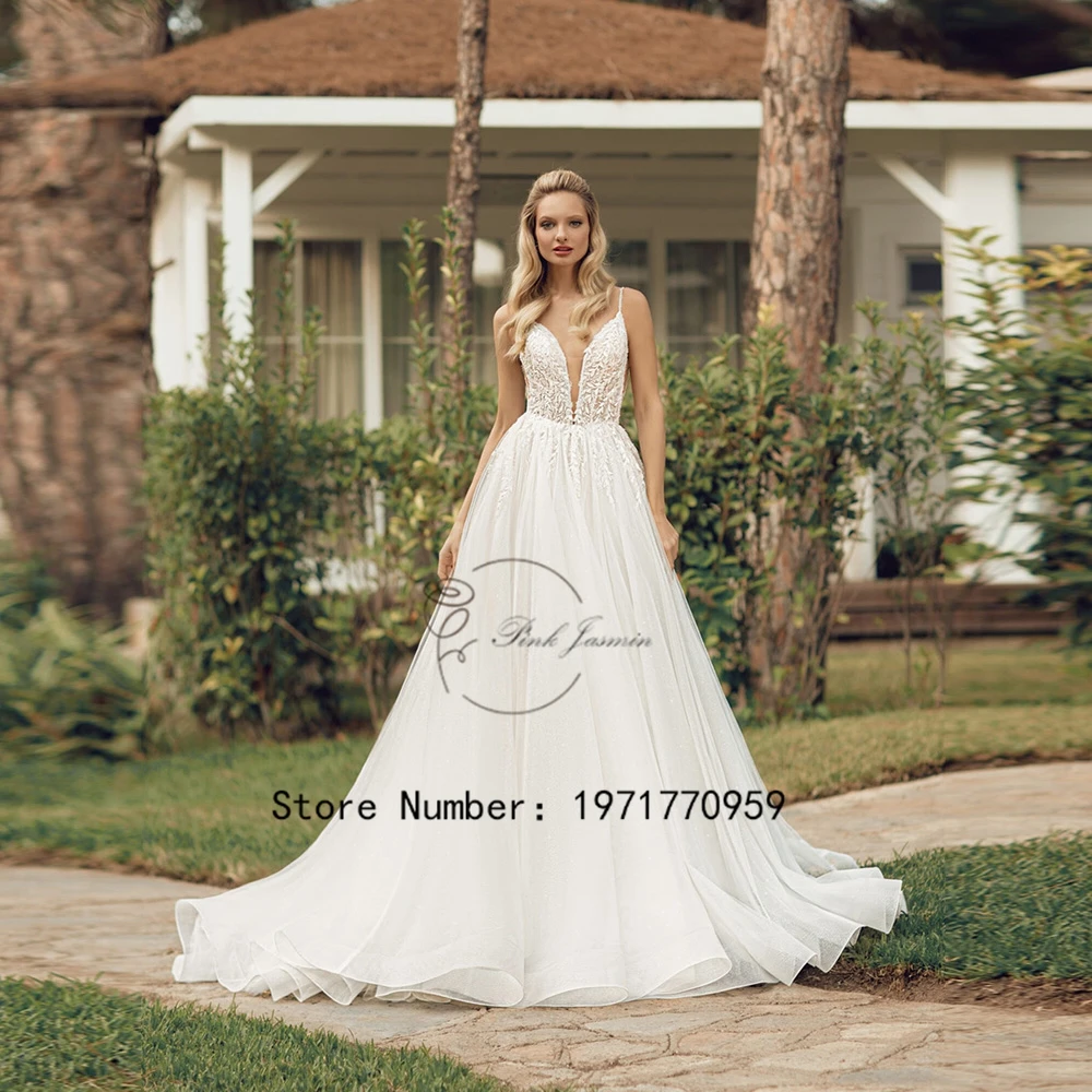 Sequined Ivory Deep V Neck Sleeveless Wedding Dresses Soft Tulle Appliques Elegant Bridal Gowns Court Train Vestidos De Novia
Sequined Ivory Deep V Neck Sleeveless Wedding Dresses Soft Tulle Appliques Elegant Bridal Gowns Court Train Vestidos De Novia