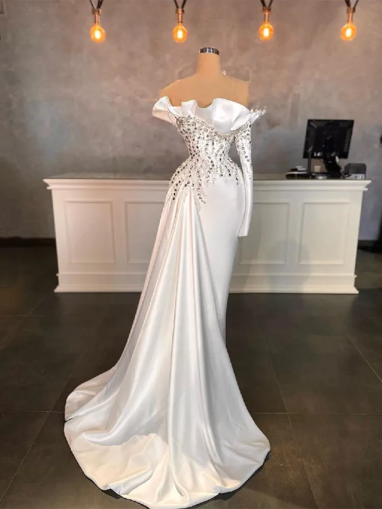 White Mermaid Evening Dresses One Long Sleeve Bateau Sequins Beaded Appliques Pearls Diamonds Satin Prom Dresses Custom Made
White Mermaid Evening Dresses One Long Sleeve Bateau Sequins Beaded Appliques Pearls Diamonds Satin Prom Dresses Custom Made
