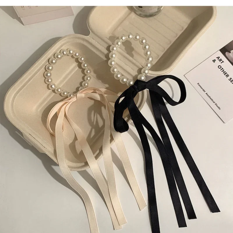 Elegant Pearl Ribbon Hair Rope Bow Knot Hair Ties Headwear Japanese Korean Ponytail Elastic Leather Band Simple Hair Accessories
Elegant Pearl Ribbon Hair Rope Bow Knot Hair Ties Headwear Japanese Korean Ponytail Elastic Leather Band Simple Hair Accessories