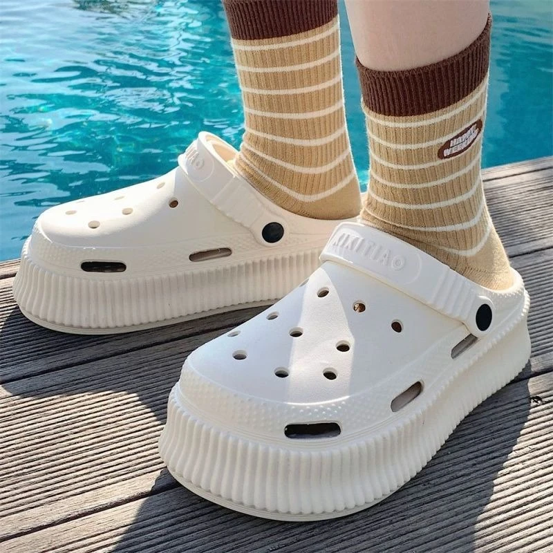 

Thin strip female summer personality outdoor non-slip Baotou shoes step on poo feel breathable EVA thick soled beach shoes