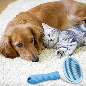 Self-Cleaning Pet Brush | Dogs & Cats, Grooming Tool A professional product shot featuring a blue and white self-cleaning slicker brush in the foreground, with a golden retriever dog and a grey tabby cat resting together on a white rug in the background.