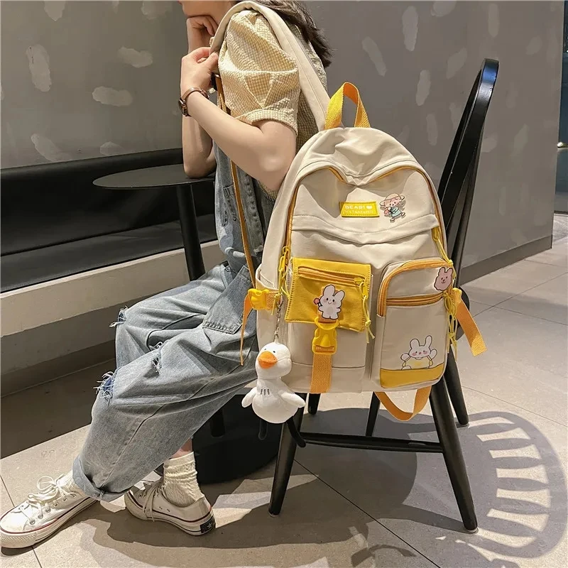 Badge Buckle Backpack Women Waterproof Color Patchwork Backpacks Teenage Girl School Bag Fancy High Capacity Student Book Bag
Badge Buckle Backpack Women Waterproof Color Patchwork Backpacks Teenage Girl School Bag Fancy High Capacity Student Book Bag