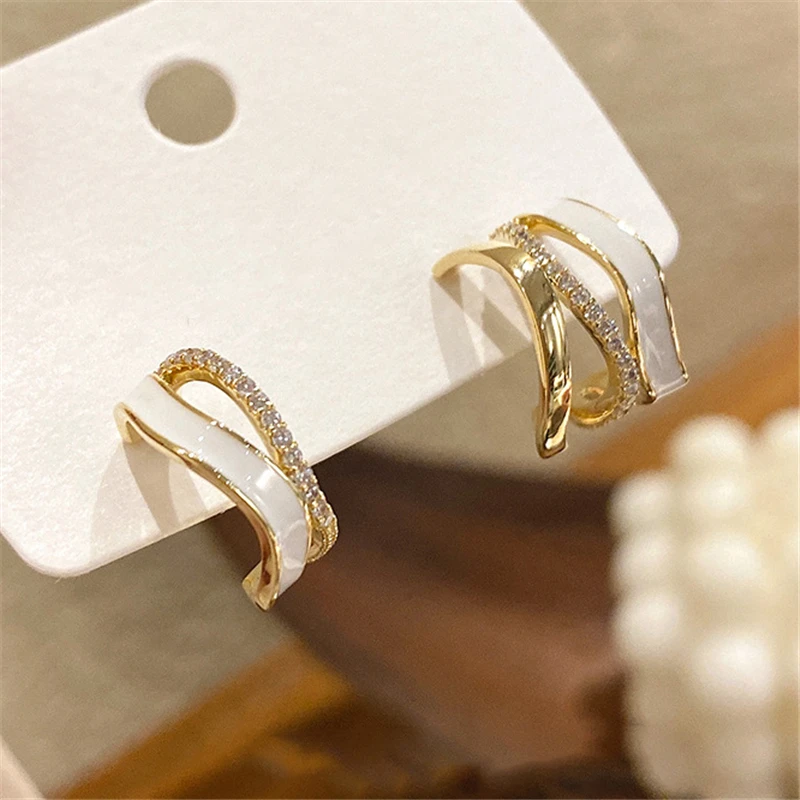 

Korean light luxury simple gold-plated earring temperament personality 925 silver needle anti-allergic and non-fading earrings