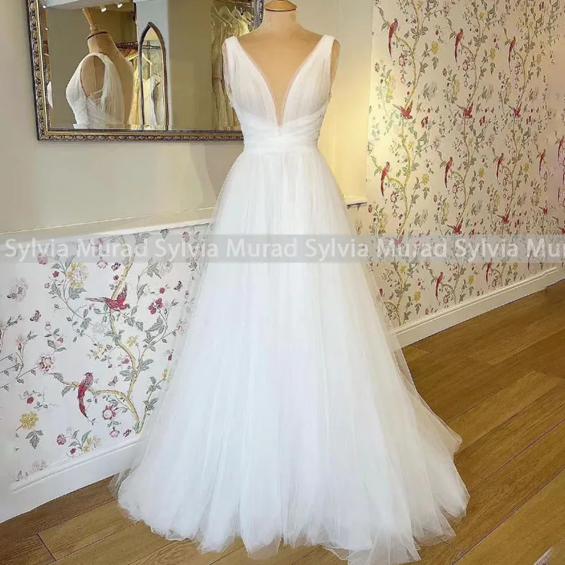 A Line Beach Wedding Dress Long Deep V Neck Sleeveless White Tulle Women Bridal Dresses Party For Women
A Line Beach Wedding Dress Long Deep V Neck Sleeveless White Tulle Women Bridal Dresses Party For Women