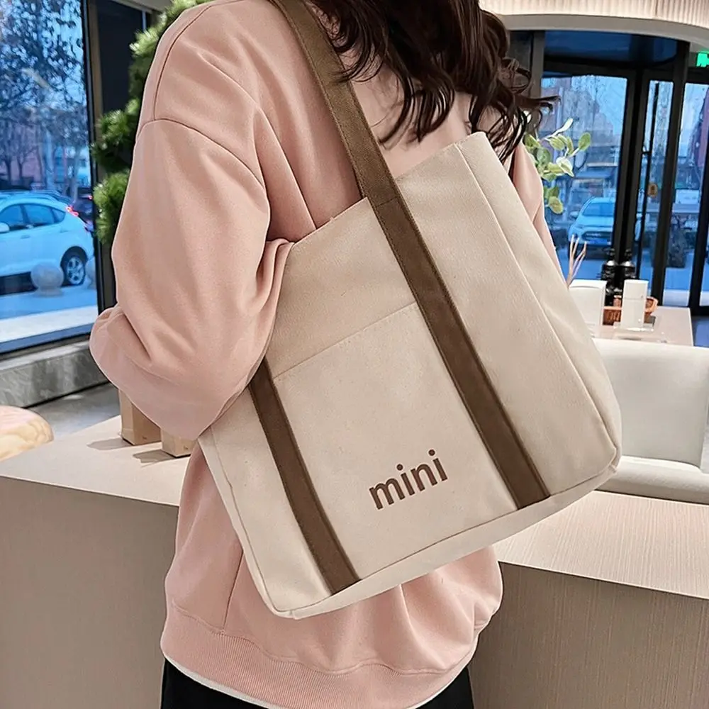 

Korean Canvas Bag Girls Student Portable Casual Shoulder Bag Mommy Shopping arge Capacity Letter Portable Tote Bag