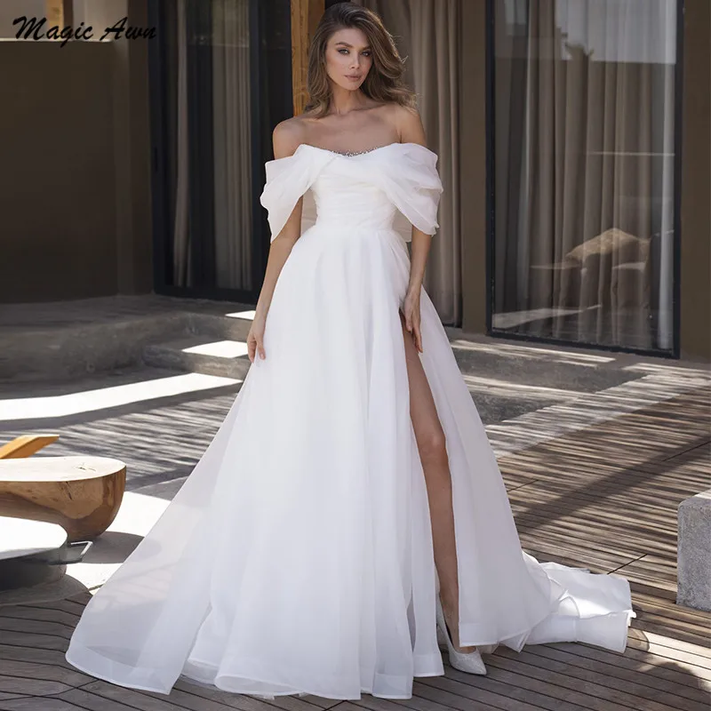 

Magic Awn Boho Wedding Dresses Side Split Illusion Off Shoulder Pearls Beaded White Beach Bridal Gowns A-Line Vestidos De Novia