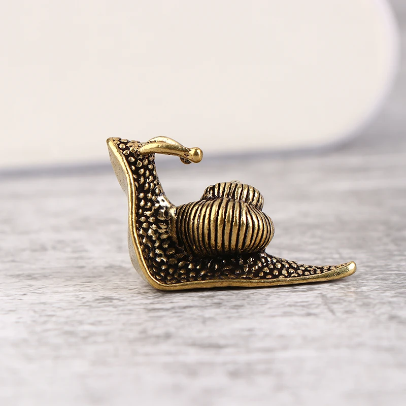 1Pc Personality Retro Brass Mini Snail Statue Ornaments Desk Antique Brass Tea Pet Collection Home Decorations For Living Room
1Pc Personality Retro Brass Mini Snail Statue Ornaments Desk Antique Brass Tea Pet Collection Home Decorations For Living Room