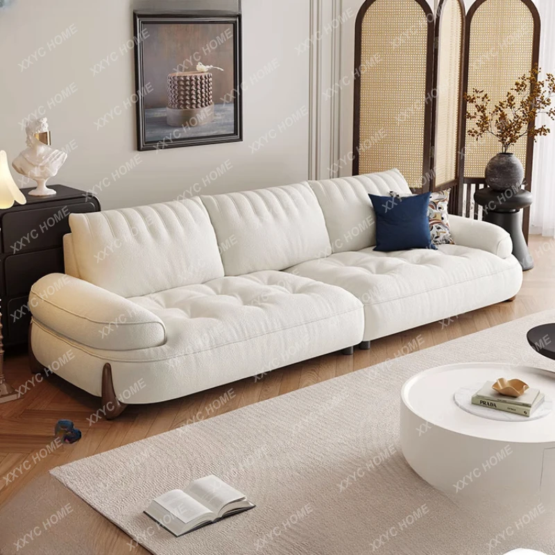

Тканевый диван кремовый стиль гостиная простая маленькая квартира облачный диван изогнутый Трехместный