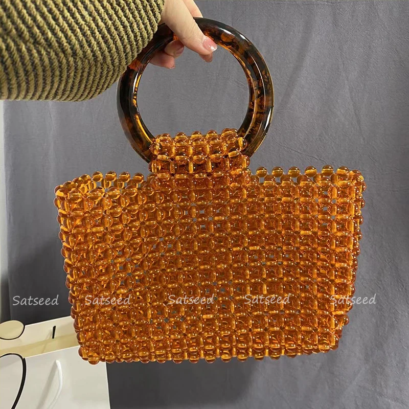 

Portable Round Fish Line Beaded Acrylic Polished Transparent Orange Beads High-end Bag