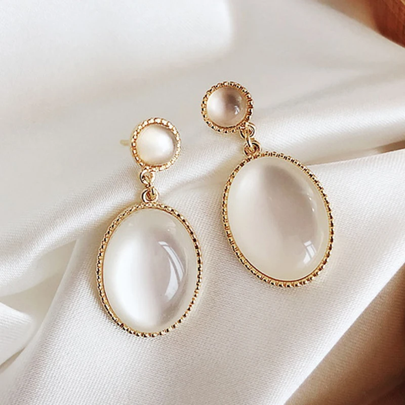 Korea New White Moonlight Cat's Eye Stone Earrings For Women Small Fresh Geometric Eardrop Elegant Ladies Temperament Jewelry 1 Mallzona S1c0132ebc4334eeda6ec02fc18e3328fp Korea New White Moonlight Cat's Eye Stone Earrings For Women Small Fresh Geometric Eardrop Elegant Ladies Temperament Jewelry Mallzona
