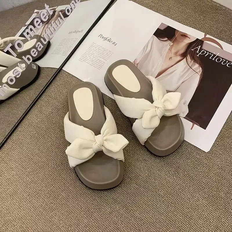 Sandals and Slippers for Women To Wear on The Outside, Fashionable Thick Sole Matching Skirt Simple Bow Tie
Sandals and Slippers for Women To Wear on The Outside, Fashionable Thick Sole Matching Skirt Simple Bow Tie