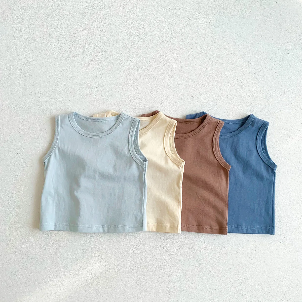 New Simple Summer Baby Vest Cotton Sleeveless Tees Newborn Clothing Solid Color Boys Girls T-shirt O-neck Toddler Infant Costume 
New Simple Summer Baby Vest Cotton Sleeveless Tees Newborn Clothing Solid Color Boys Girls T-shirt O-neck Toddler Infant Costume