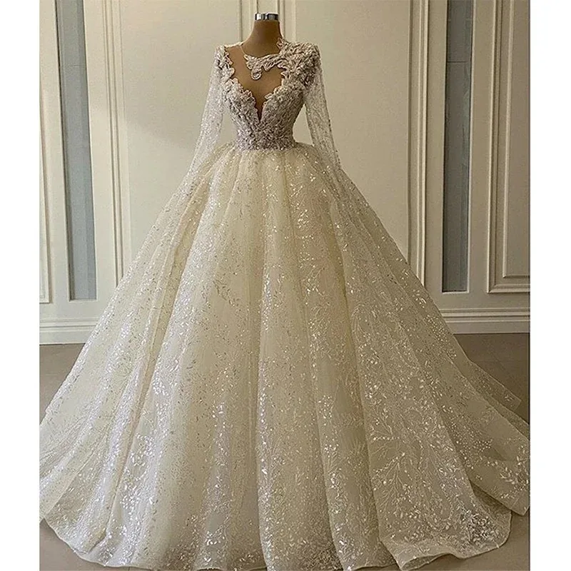 2024 Luxury Sequins Ball Gown Wedding Dresses Long Sleeves Sheer O-neck Beaded Princess Bridal Gowns Vestido Fiesta Noche Custom
2024 Luxury Sequins Ball Gown Wedding Dresses Long Sleeves Sheer O-neck Beaded Princess Bridal Gowns Vestido Fiesta Noche Custom