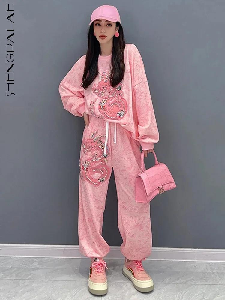 SHENGPALAE, Модный женский комплект из 2 предметов с принтом дракона, топы с круглым вырезом и жемчужинами, повседневные брюки, весна 2024, новинка 5R9204
SHENGPALAE, Модный женский комплект из 2 предметов с принтом дракона, топы с круглым вырезом и жемчужинами, повседневные брюки, весна 2024, новинка 5R9204