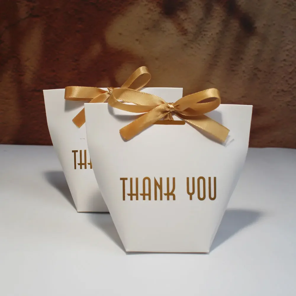 Элегантные подарочные коробки и пакеты с надписью Thank You, товары для свадебной вечеринки с простой атмосферой, белые коробки и пакеты для конфет
Элегантные подарочные коробки и пакеты с надписью Thank You, товары для свадебной вечеринки с простой атмосферой, белые коробки и пакеты для конфет