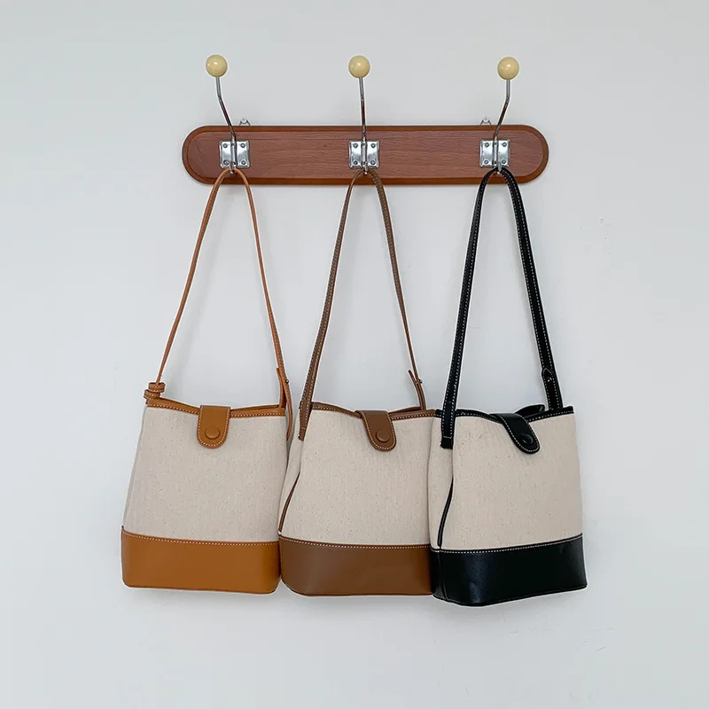 Underarm Bag Large Capacity Patchwork Canvas Bucket Women's New Shoulder Bag All-match Commuter Tote
Underarm Bag Large Capacity Patchwork Canvas Bucket Women's New Shoulder Bag All-match Commuter Tote