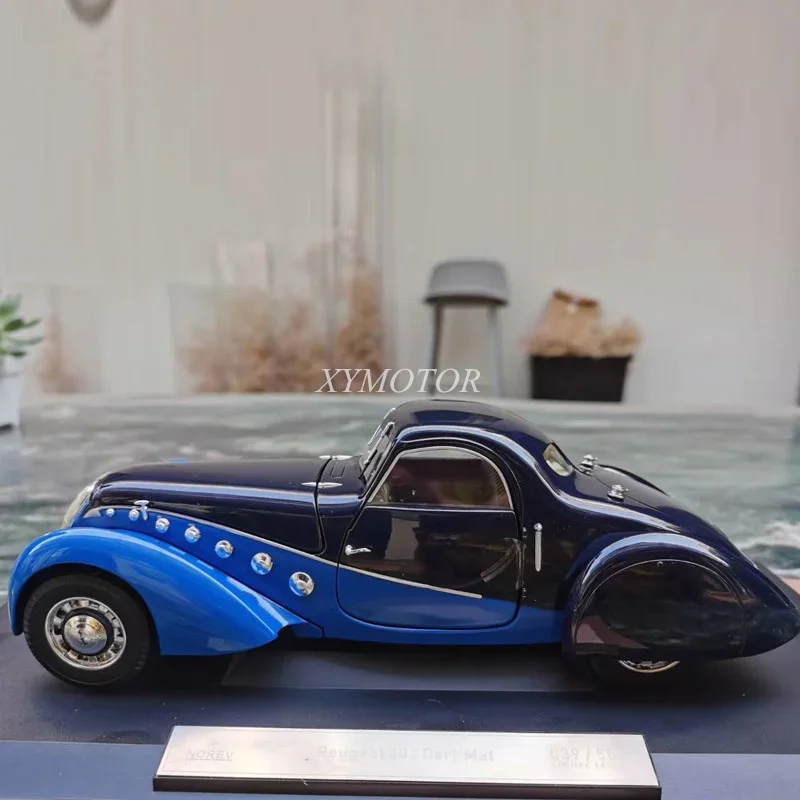 Norev 1/18 для Peugeot 302 коврик 1937 металлическая литая модель автомобиля черные синие Игрушки для мальчиков подарки хобби демонстрация орнаментов коллекция
Norev 1/18 для Peugeot 302 коврик 1937 металлическая литая модель автомобиля черные синие Игрушки для мальчиков подарки хобби демонстрация орнаментов коллекция