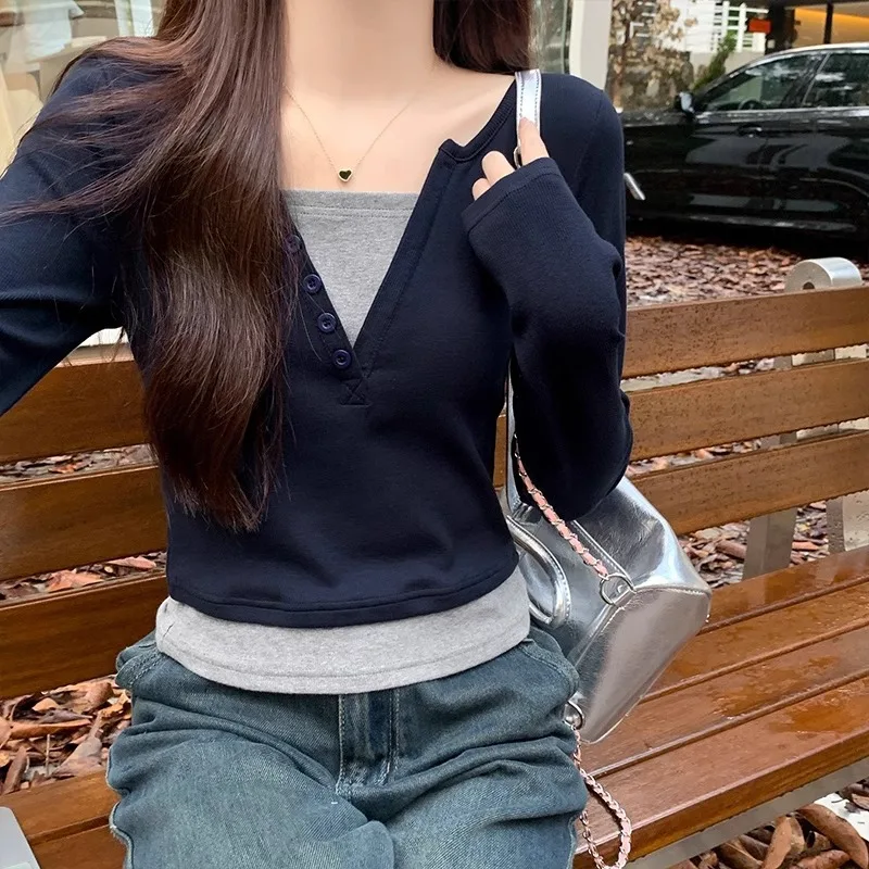 

Korean version of contrasting color patchwork fake two-piece top for women's spring and autumn half open collar commuting inner